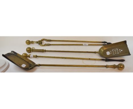 A set of three brass fire irons, and a similar shovel (4) 