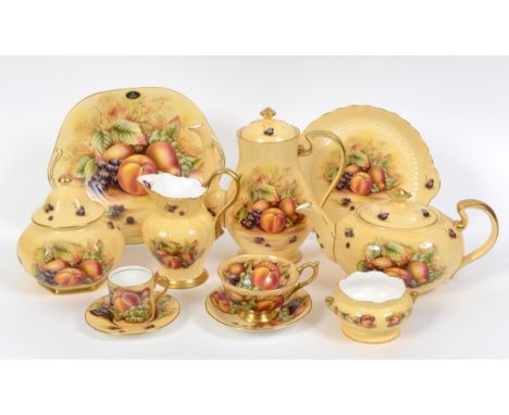 An Aynsley Orchard Gold pattern tea and coffee service, including a teapot and cover, a coffee pot and cover, sixteen coffee 