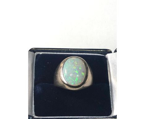 Fine large 18ct white gold opal ring set with large opal that measures approx 15mm by 11mm weight of ring approx 12g 