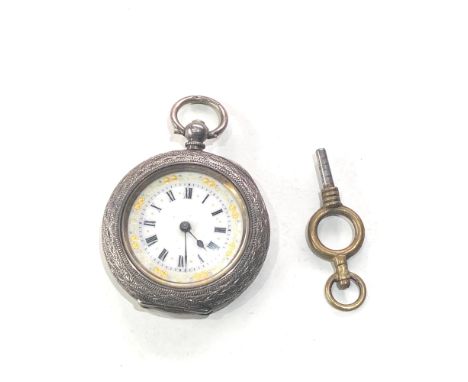Antique ladies silver enamel dial fob watch case measures approx 36mm dia watch is in good condition does tick and comes with