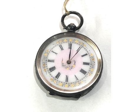 Antique ladies silver enamel dial fob watch case measures approx 38mm dia watch is in good condition does tick and comes with