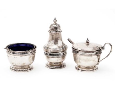 A George V three piece silver condiment set, by Jones &amp; Crompton, Birmingham, 1927, each decorated with a beaded rim and 