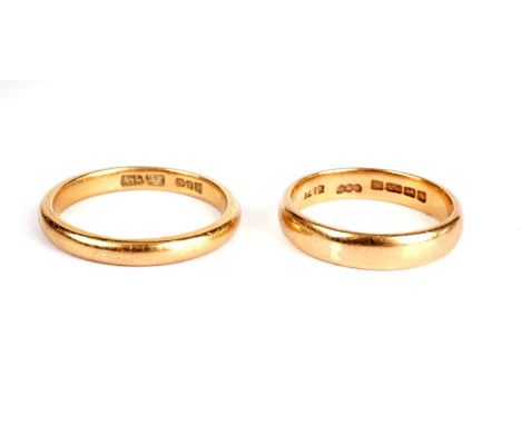 A 22ct yellow gold wedding band, size K; and another, size M, 7.6g gross.