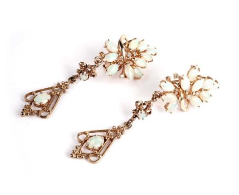 A pair of opal and diamond clip-on drop earrings, each approximately 63mm high, in yellow gold, stamped '585', 9.9g gross. 