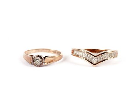 A solitaire diamond ring, in 9ct yellow gold, size K; together with a diamond and 9ct yellow gold wishbone band, size M, 4.8g