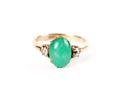 A jade coloured stone and diamond ring, in yellow gold, stamped '18ct', size L 1/2, 3.2g gross.
