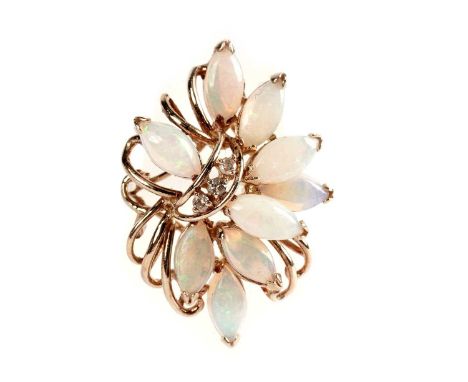 An opal and diamond spray ring, in yellow gold, stamped '14K' and '585', size O 1/2, 5.8g gross. 