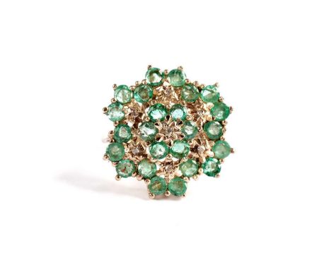 An emerald and diamond cluster ring, in 9ct yellow gold, size O, 4.4g gross. 