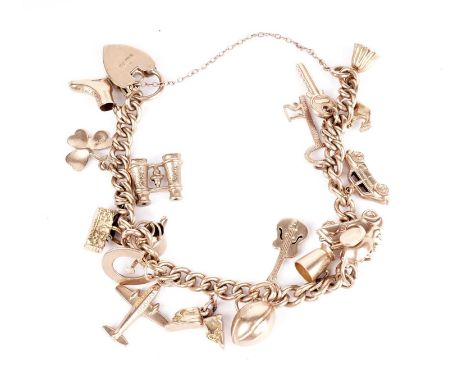 A 9ct yellow gold charm bracelet, with charms including an ice-skate, an airplane, a scooter, a car and others, most hallmark
