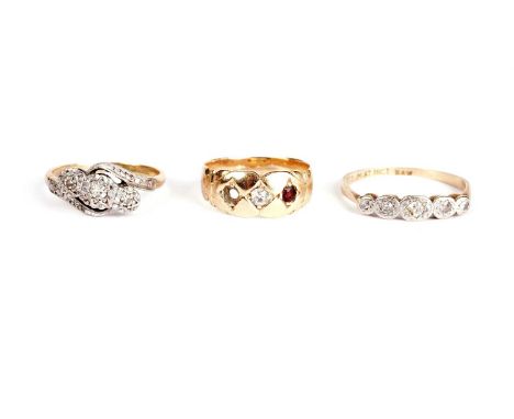 A diamond five stone ring, in platinum mount and 18ct yellow gold shank, size O; and an 18ct yellow gold diamond trilogy ring