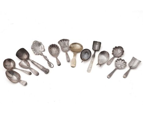 A collection of silver caddy spoons, including: a Victorian silver caddy spoon, by George Unite, Birmingham, likely 1856, of 