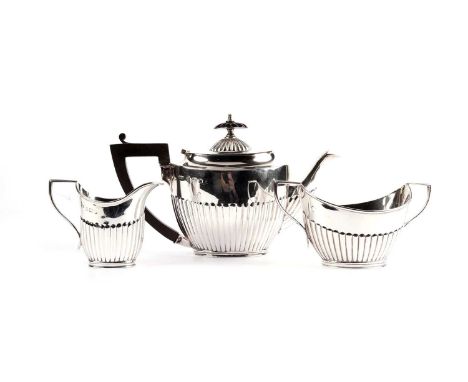 An Edwardian silver three piece tea service, by Elkington &amp; Co Ltd, Birmingham 1902, 15.9oz gross. 