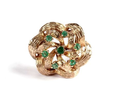 An emerald cluster dress ring, of textured, knot twist design, in 9ct yellow gold, size P, 5.7g gross.