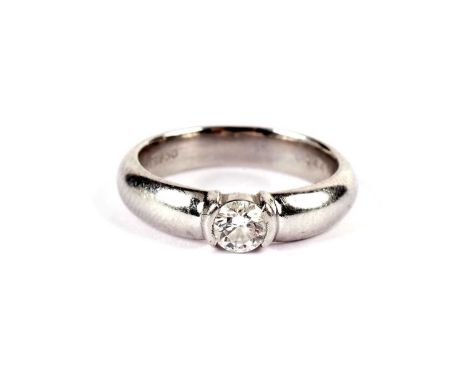 A Tiffany &amp; Co solitaire diamond ring, the round brilliant cut diamond weighing approximately 0.29 carats, in platinum, s