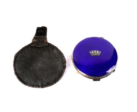An Art Deco silver powder compact, by John William Barrett, Birmingham 1940, the hinged cover with royal blue enamel and crow