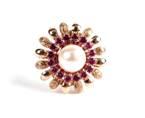 A pink sapphire and cultured pearl flower cluster dress ring, in yellow gold, stamped 'K14', size P, 5.3g gross. 