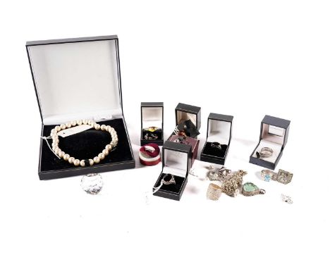 A selection of costume jewellery, including: a silver heart shaped pendant; a white metal playboy bunny ring; a cultured pear