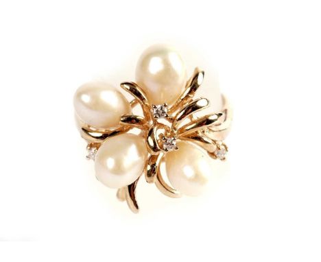 A diamond and baroque pearl dress ring, in yellow gold, stamped '14K', size P 1/2, 4.1g gross.