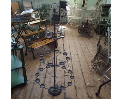 Three tier floor standing metal revolving tea light holder for 24 lights - appx 4' high 