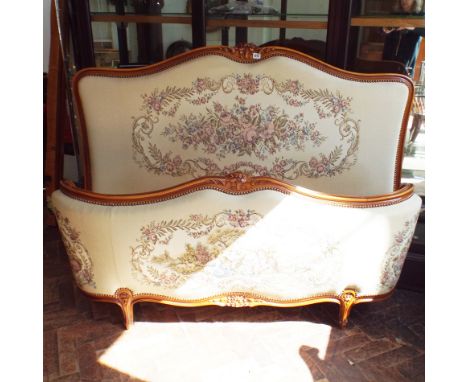 4'6 French walnut framed bedstead with floral tapestry upholstered head and foot board 