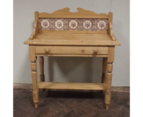 3' Victorian stripped pine wash stand with brown patterned tile back fitted one long drawer and shelf under 