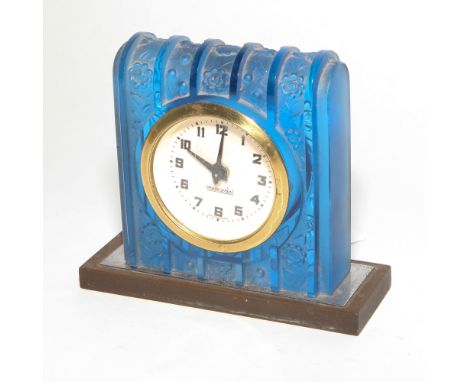 1930's blue pressed glass moulded mantel clock, moulded with flowers with clock inset signed 'Mercedes, Made in Germany', 11 