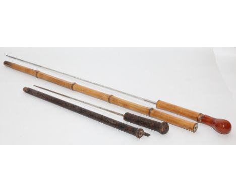 Bamboo walking cane with onyx handle and a leather covered whip handle 