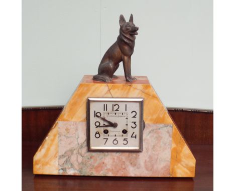Striking mantel clock in coloured marble case with spelter Alsatian mount, by Levaigner Jacqueline 