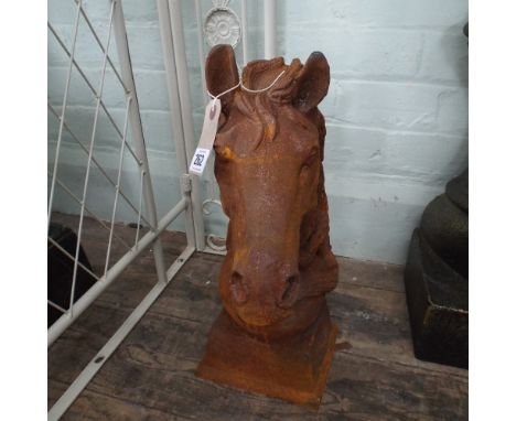 Pair of weathered cast iron horse head gate post finials, height 45cm high.  Plinth measures 18cm x 16cm deep 