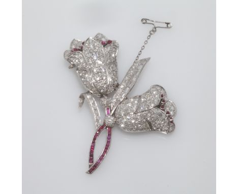 Vintage platinum, diamond and ruby tulip flower spray  brooch, circa 1940-1950, set with brilliant pave set diamond petals an