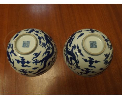 Two Chinese blue and white bowls , diameter 14.5 cms each, brass vase, various Japanese vases, bowls etc.  one blue and white