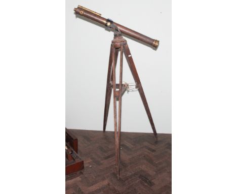 Large Victorian brass coloured telescope with various lenses in fitted mahogany case with wooden tripod stand by Watson and S