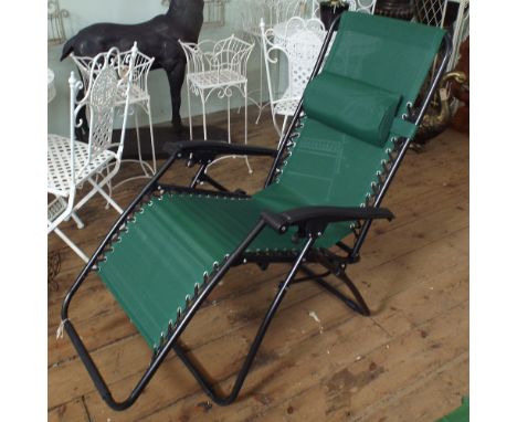 New green textaline reclining garden chair with headrest cushion on black folding frame 