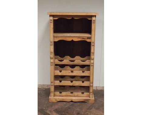 Stripped and waxed pine wine rack with shelf over 2' wide x 50" high 