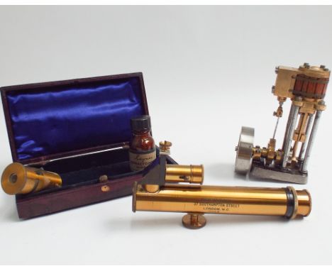 Brass refractometer in fitted case by J Browning Southampton St London, numbered 7068,  together with a small model of a stea