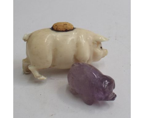 19th century carved ivory pig pin cushion 6.5cm long and a amethyst carved miniature pig 