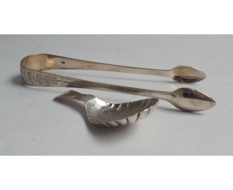 Pair of Georgian silver sugar tongs with bright cut decoration and a caddy spoon with shell patterned bowl (a/f)  Condition -