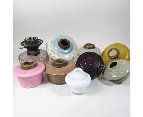 A collection of nine various glass oil lamp fonts (9)