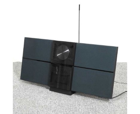 A Bang and Olufsen upright CD cassette player, 75 x 33cmOverall appears to work, but is dusty and slightly dirty, but looks l