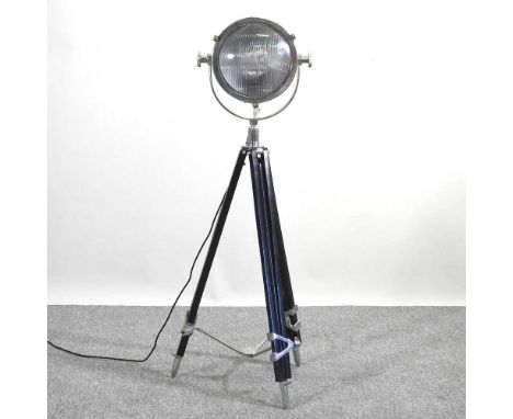 A modern standard lamp, in the form of an adjustable stage light, by Culinary Concepts, London