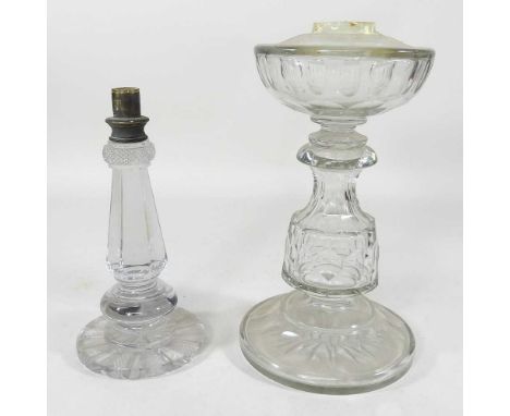A 19th century cut glass lamp base, 23cm high, together with a larger glass oil lamp base (2)