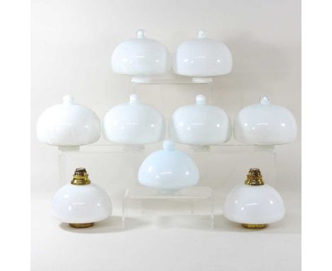 A collection of nine white opaque glass oil lamp fonts (9)