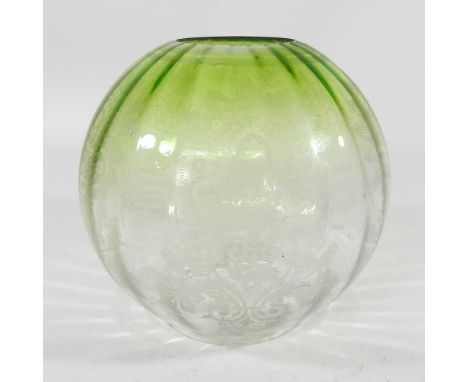 A green and clear glass oil lamp shade, with etched decoration, 10cm aperture