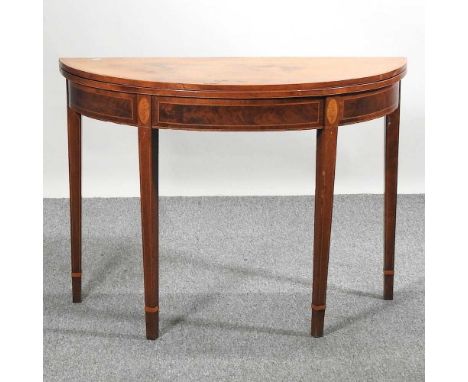 A George III mahogany and chequer strung half round folding card table, on square tapered legs100w x 43d x 73h cm