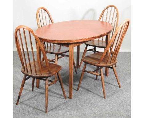 A set of four Ercol dining chairs, together with a dining table with a later top (5)140 x 85cm