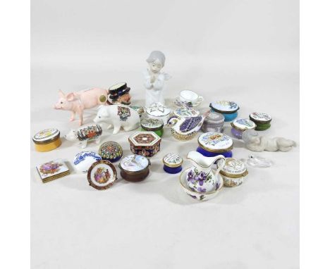 A collection of porcelain and enamel boxes, to include Royal Crown Derby, Lladro, Beswick and Royal Doulton