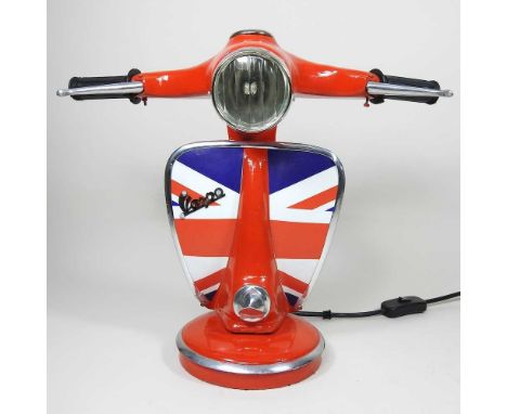 A red table lamp, in the form of a Vespa, 33cm high