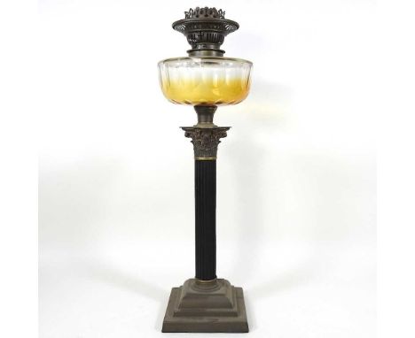 A 19th century brass oil lamp base, in the form of a Corinthian column, with a faceted glass reservoir, 54cm highOverall comp