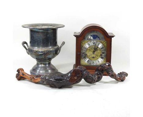 A reproduction mantel clock, together with a silver plated wine cooler, 25cm high, and a rustic corkscrew (3)