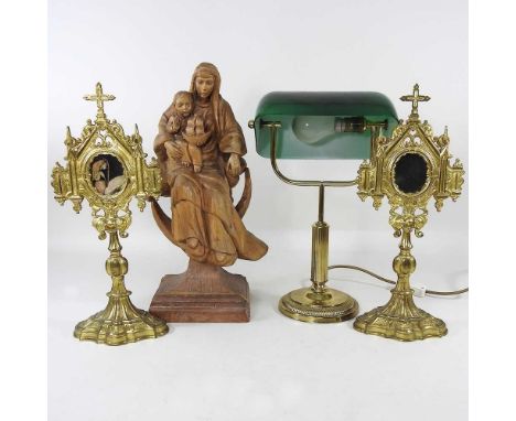 A continental carved wooden figure of the Virgin, inscribed Stella Maris, 43cm high, together with a pair of gilt metal stand